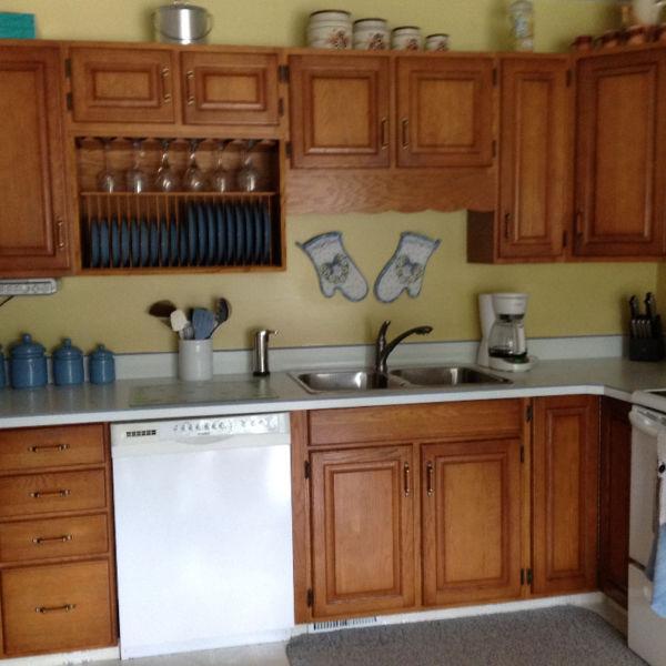 Kitchen cabinets, buffet and hutch with countertops