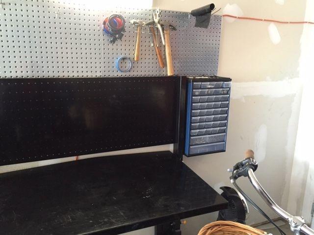 Folding Workbench with peg board and small bins
