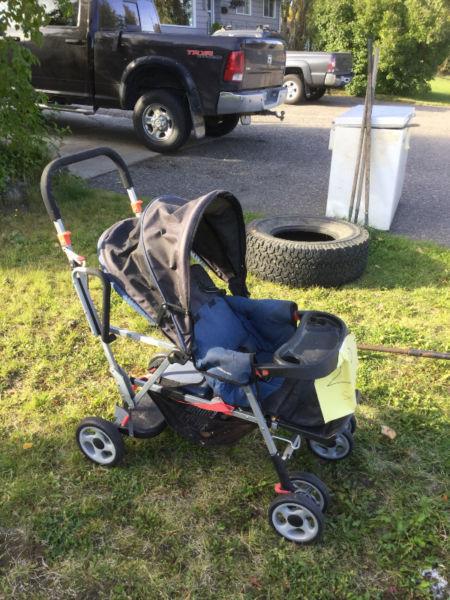 Double stroller baby in front toddler in back