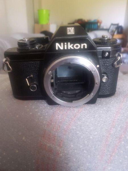 Nikon EM camera with Nikon Series E 50 mm lens