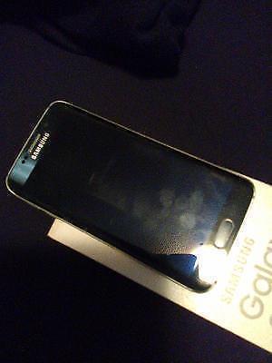 32gb s6 edge locked to bell with case and orig acc 450 obo