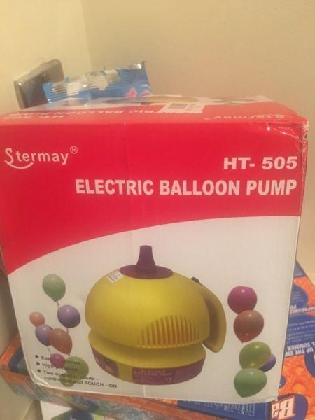 Electric balloon pump $60 firm. Brand new