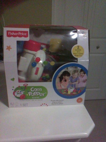 Brand new fisher price corn popper game