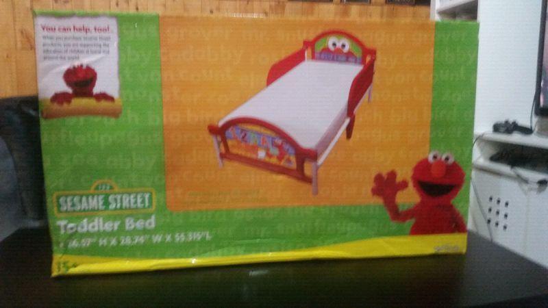 Brand new in box sesame Street toddler bed
