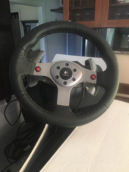 Logitech G25 steering wheel controller for sale