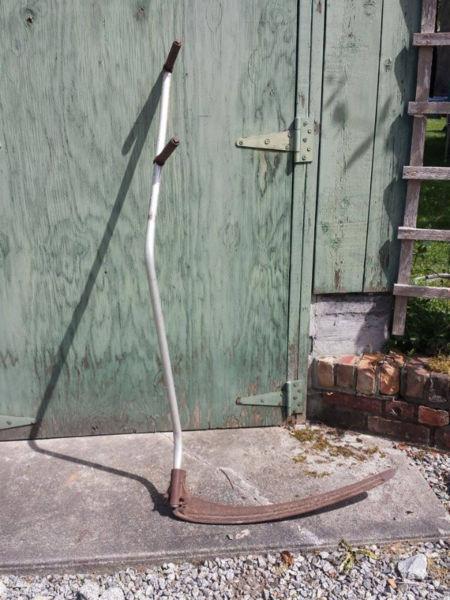 vintage scythe , still sharp and works