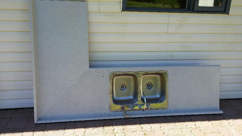 countertops. one with sink and faucet