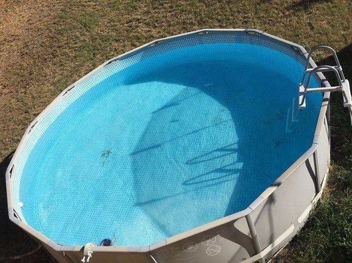 Large above ground pool with new pump, filter, chemicals, ladder