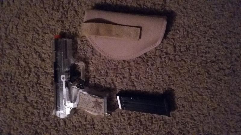 Air soft bb Handgun with holster