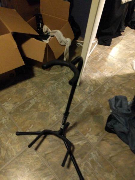 Barely used guitar, stand, and vinyl case