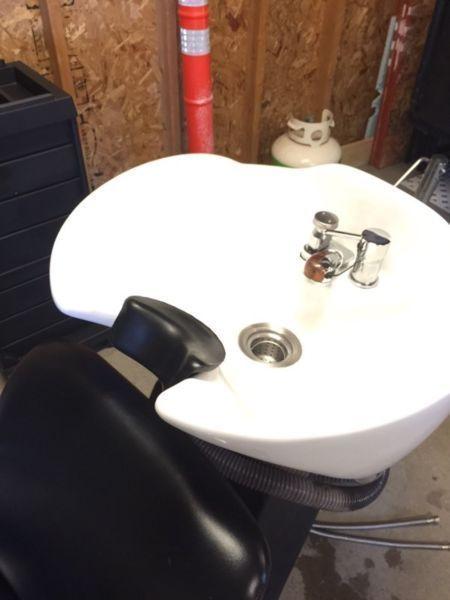 Hairstylist sink and chair