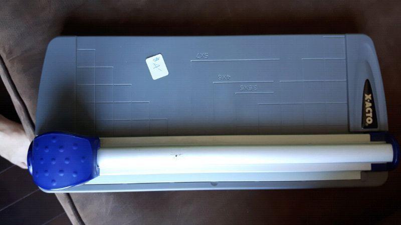 X- acto paper cutter