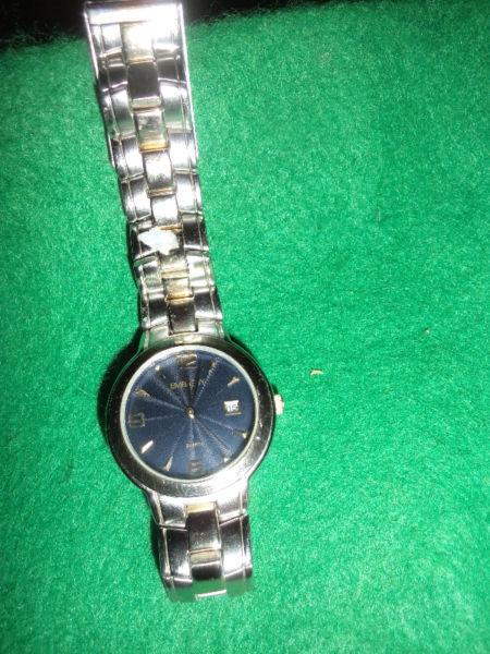 mens stainless steel quartz wrist watch by Embassy -shows date