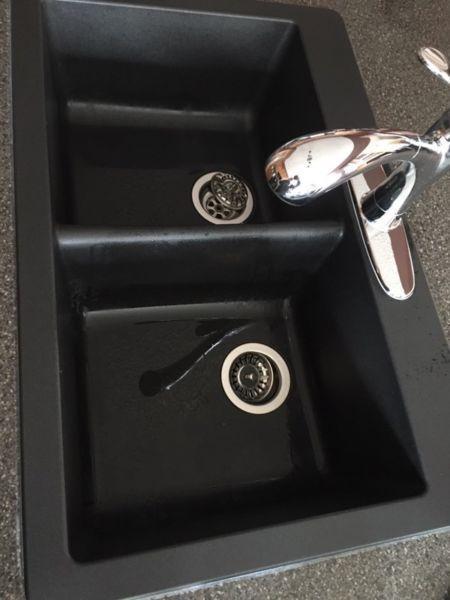 Black granite sink with faucet in perfect condition