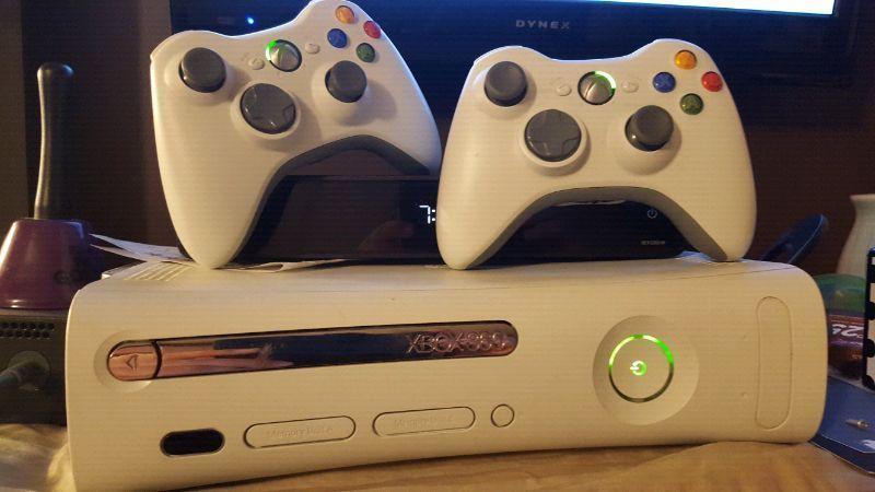 Xbox 360 with controllers