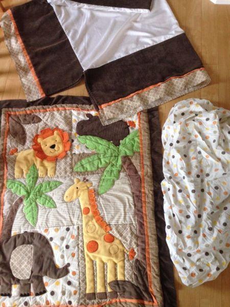 Jungle theme crib set, includes sheet, comforter and crib skirt