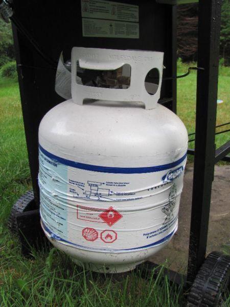 Full twenty pound propane tank for barbeques $42