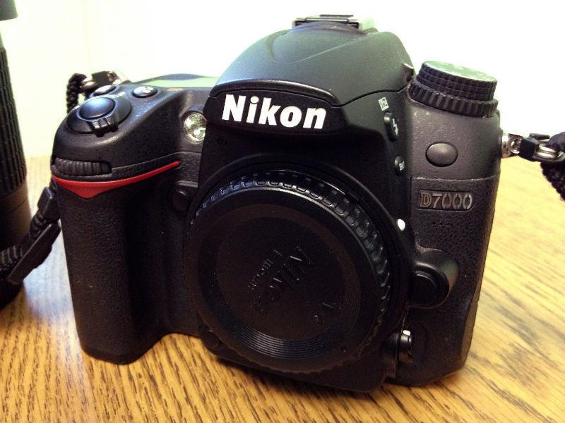 Nikon D7000 DSLR, 2 lenses, battery charger, filters