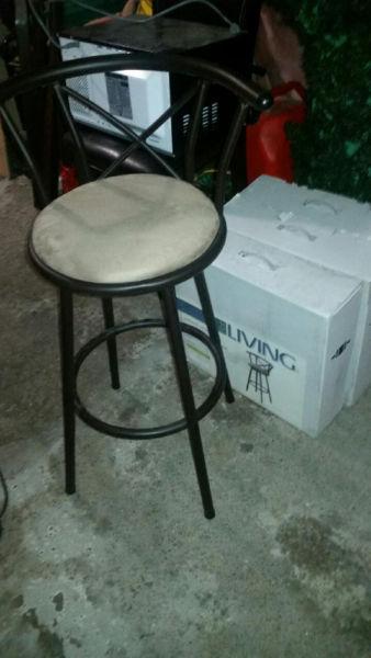 4 barstools. Never used. 3 still in boxes