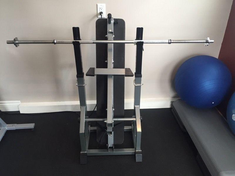 Bench with 110 lbs adjustable weights and rack