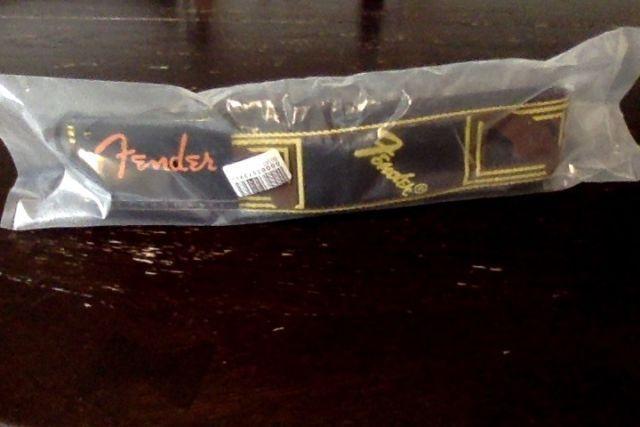 still sealed in the bag new fender guitar strap .. $10