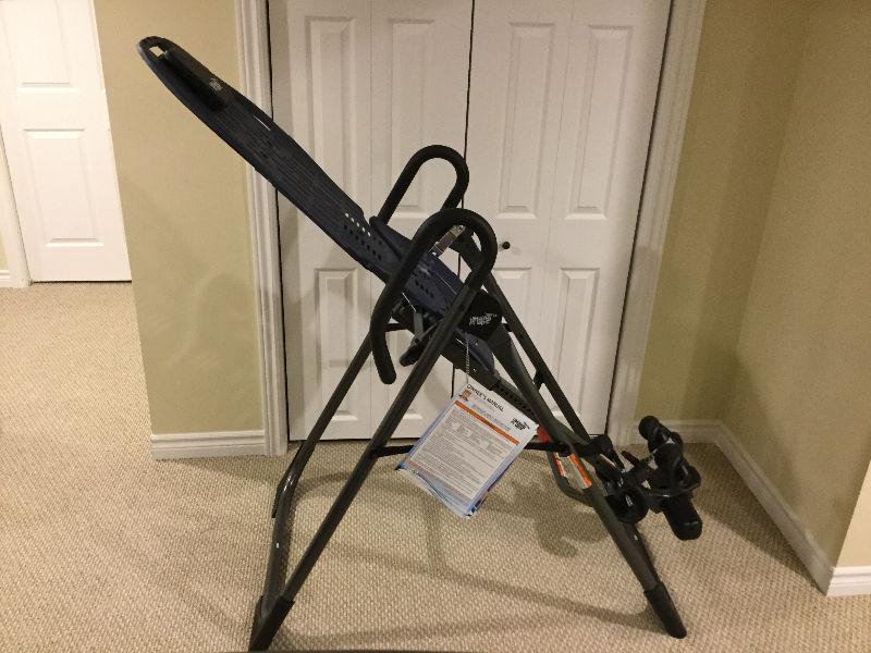 Inversion table, served its purpose. 325$ OBO deliver in town