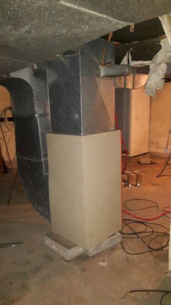 Electric forced air furnace with duct work