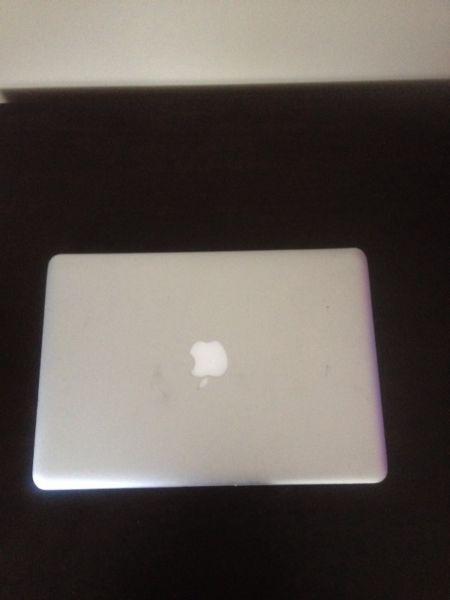 Mac book pro with brand new charger