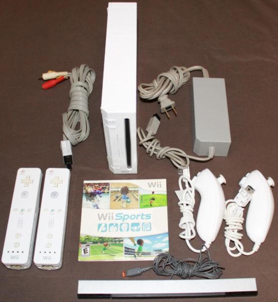 Wii Console, 2 Controllers, 2 Nun Chucks & Wii Sports