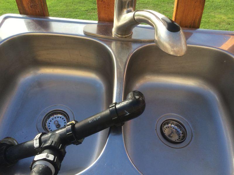 Double stainless steal kitchen sink with MOEN Fossett