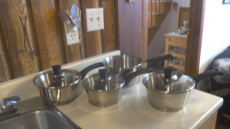 4 stainless steel pots with glass tops