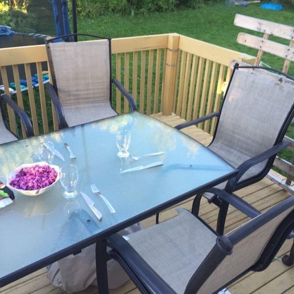 Outdoor large glass table and five chairs