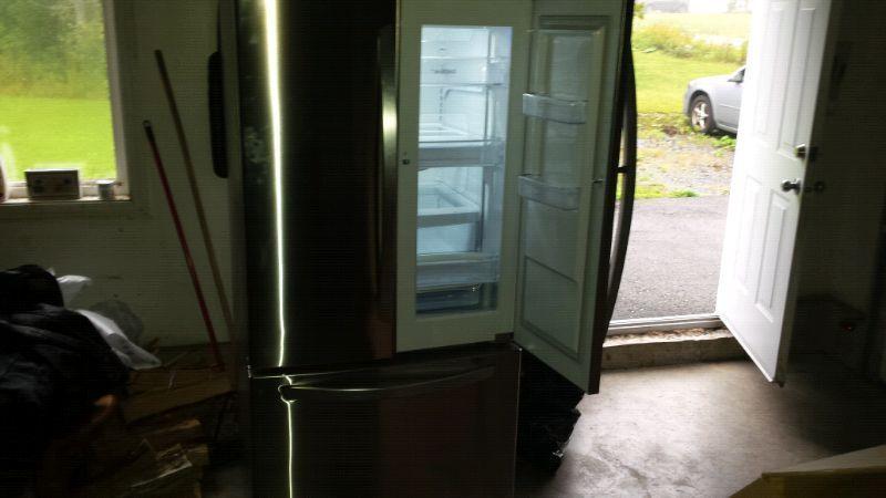 Almost new lg french door fridge stainless steel icemaker