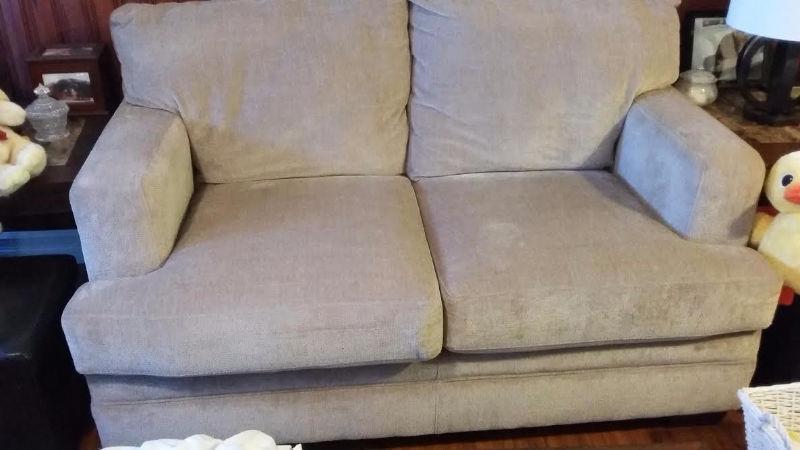 Three month old excellent cond extra deep beige love seat