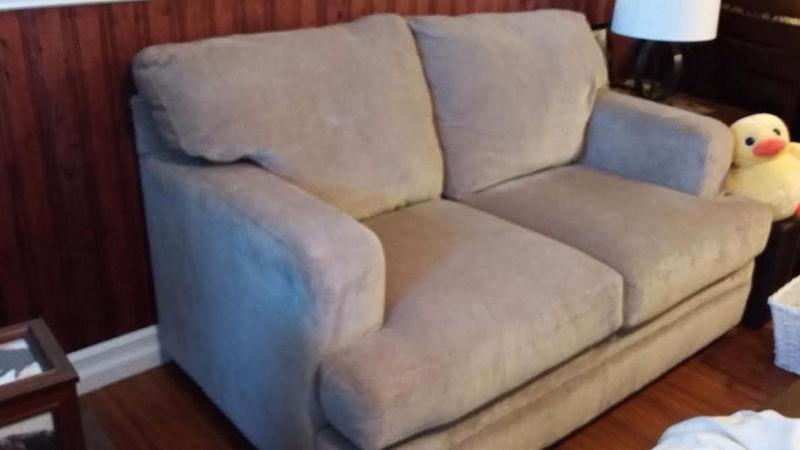 Three month old excellent cond extra deep beige love seat