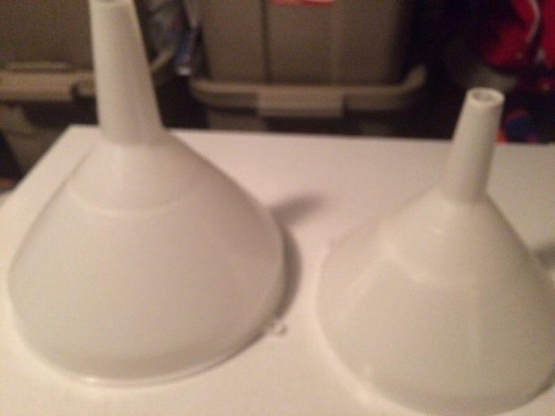 2 large funnels used in beer making