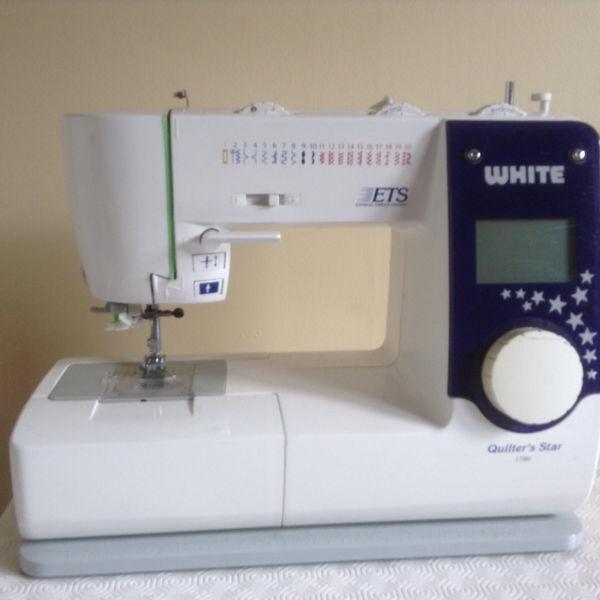 White quilters star sewing machine