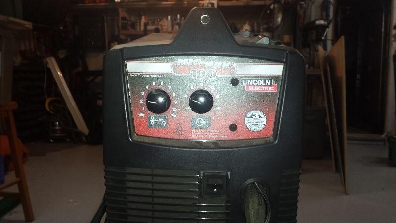 Lincoln Mig 180 Welder with rolling stand