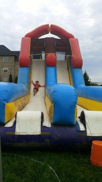For sale!! Xtra Large Double Slide Inflatable Jumping Castle