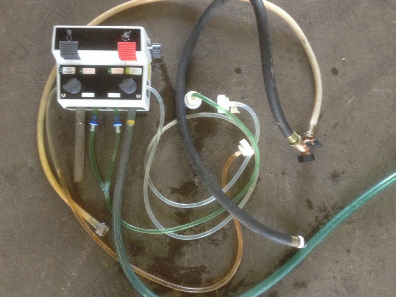 Used Chemical Dispensing System with extra hoses