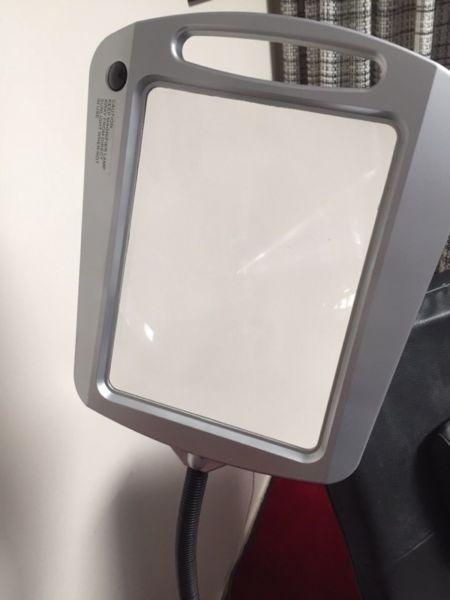 Large stand up magnifying glass with light