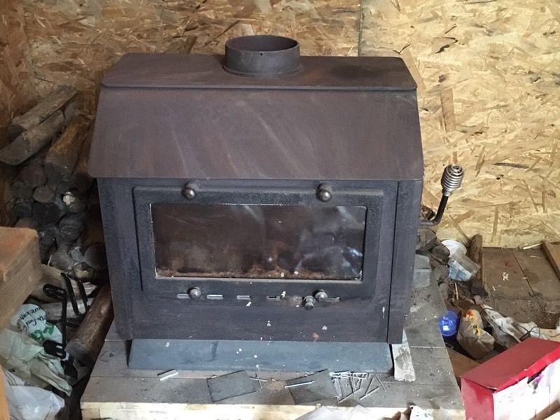 Side load wood stove