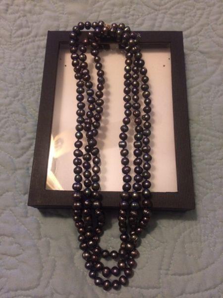 Genuine black pearls