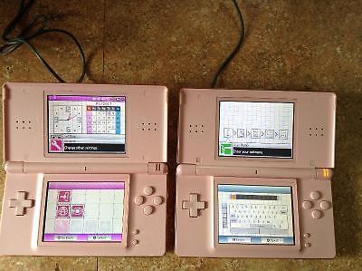 TWO NINTENDO DS LITES W/GAMES