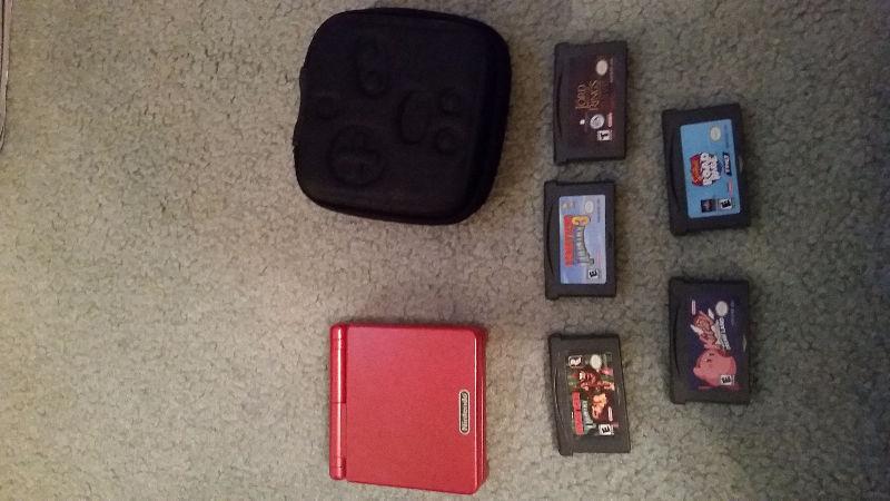 Nintendo sp with games