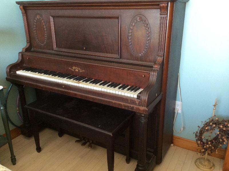 Beautiful old piano and bench for sale