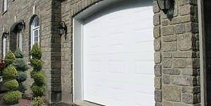 Broken spring from garage door?? Call GARAGE REPAIR.CA