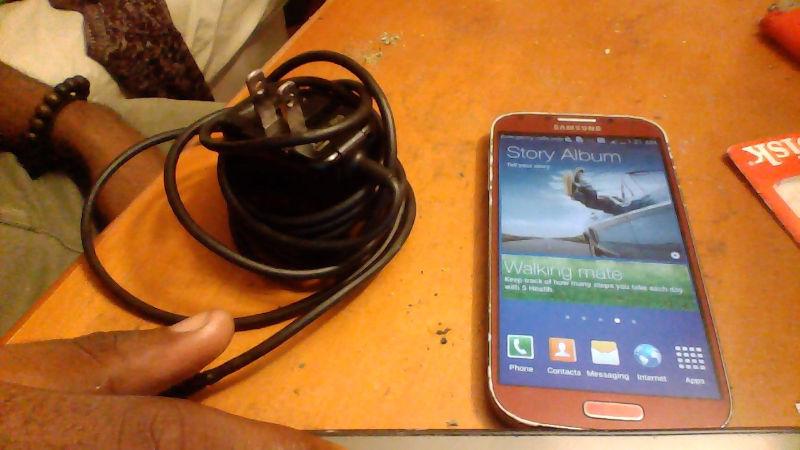 FACTORY UNLOCKED RED GALAXY S4. CONDITION 8/10