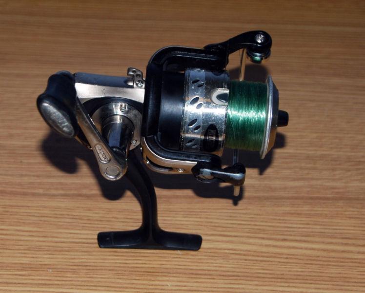 Mitchell 300XE Spinning Reel with 8 lb test line 5 bearing driv