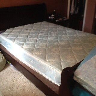Queen size bed with basic metal frame